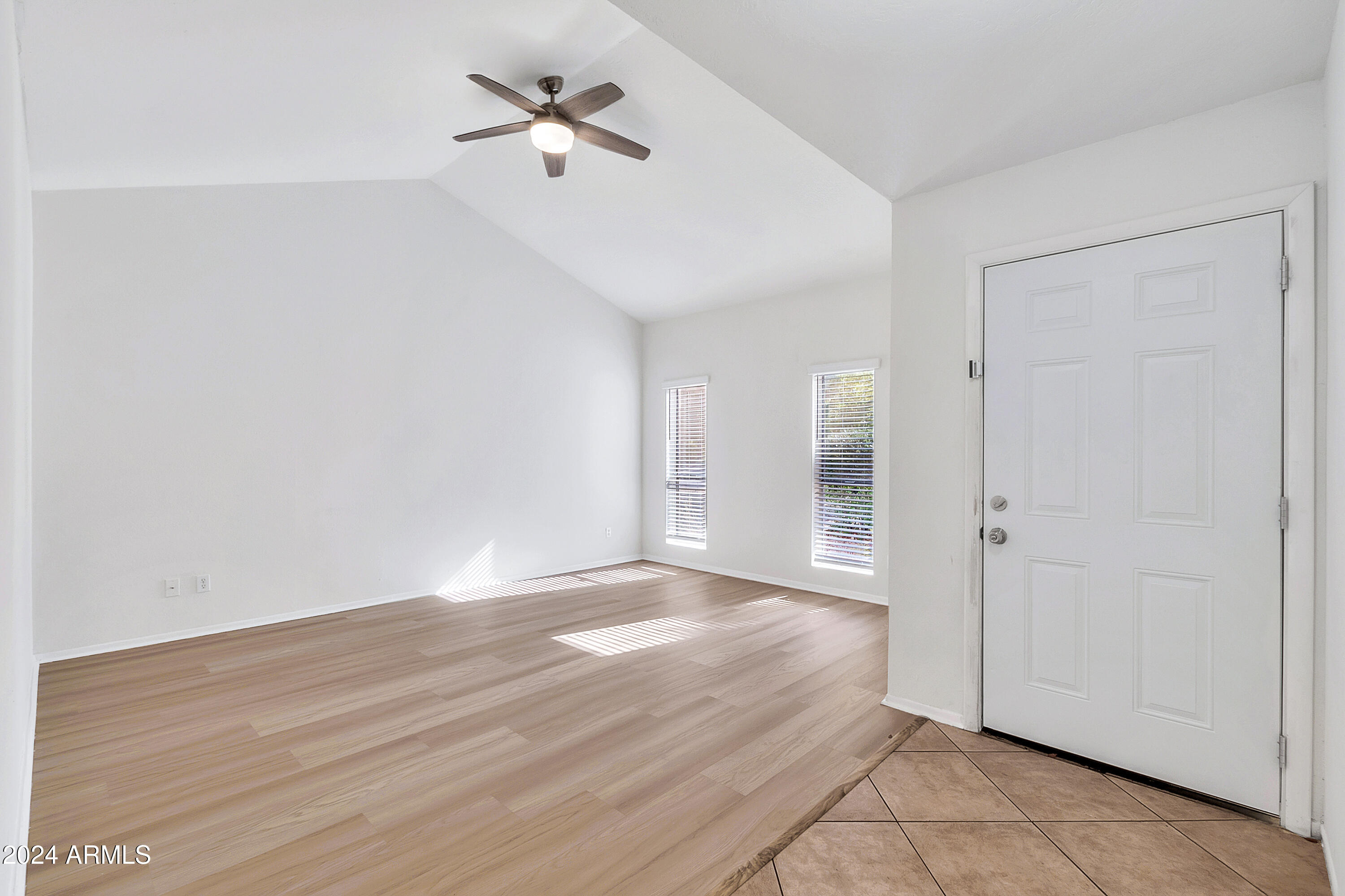 5234 East Blanche Drive Scottsdale, AZ 85254 - Photo 3 of 20 a view of empty room with wooden floor