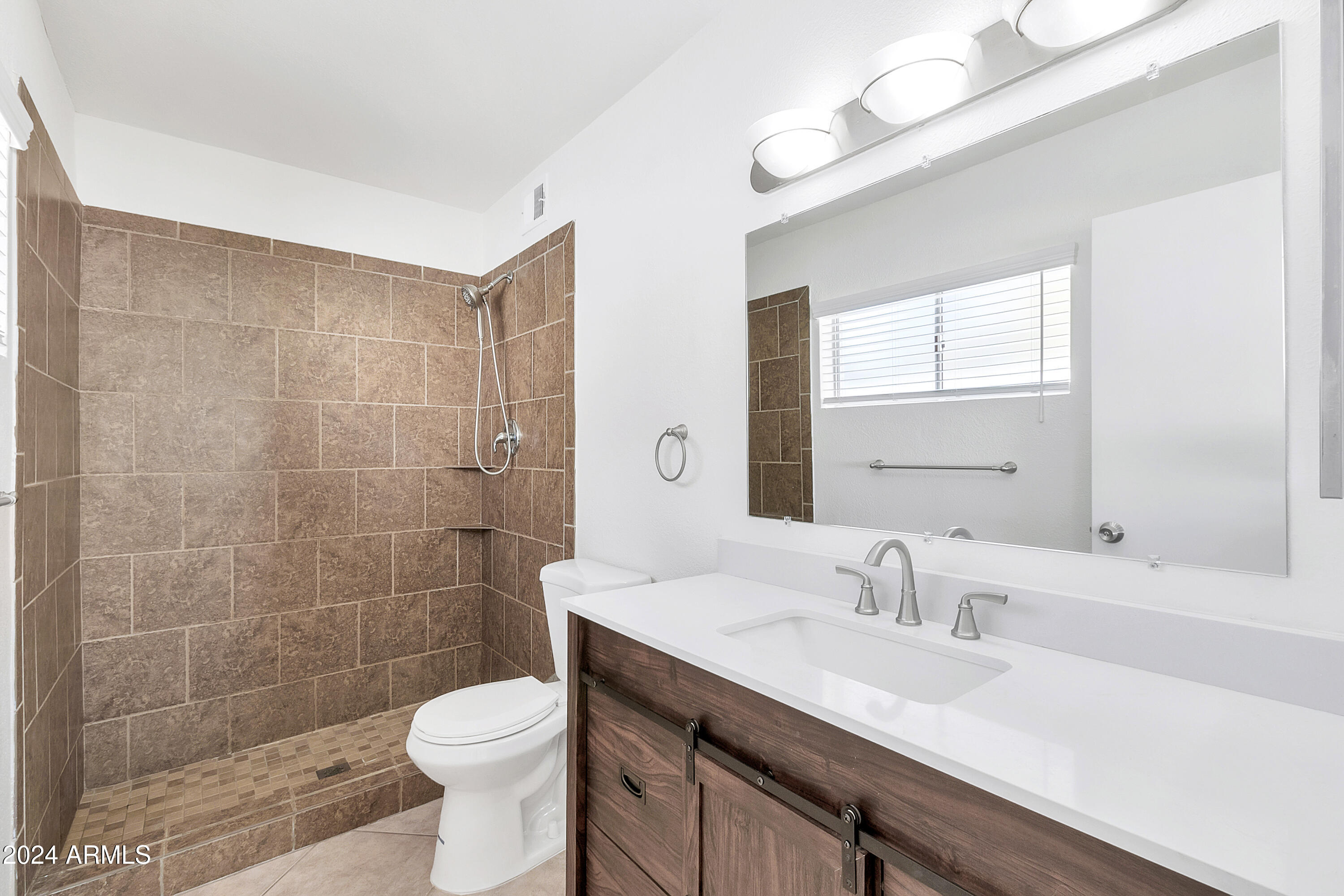 5234 East Blanche Drive Scottsdale, AZ 85254 - Photo 9 of 20 a bathroom with a sink a toilet and shower