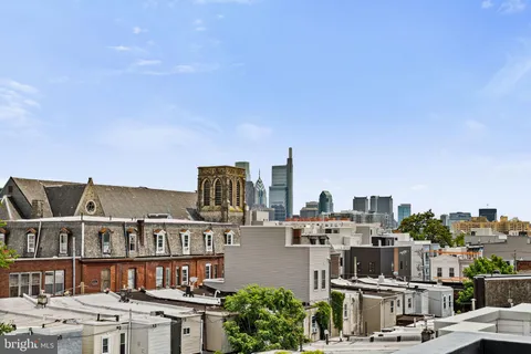a view of city with tall buildings
