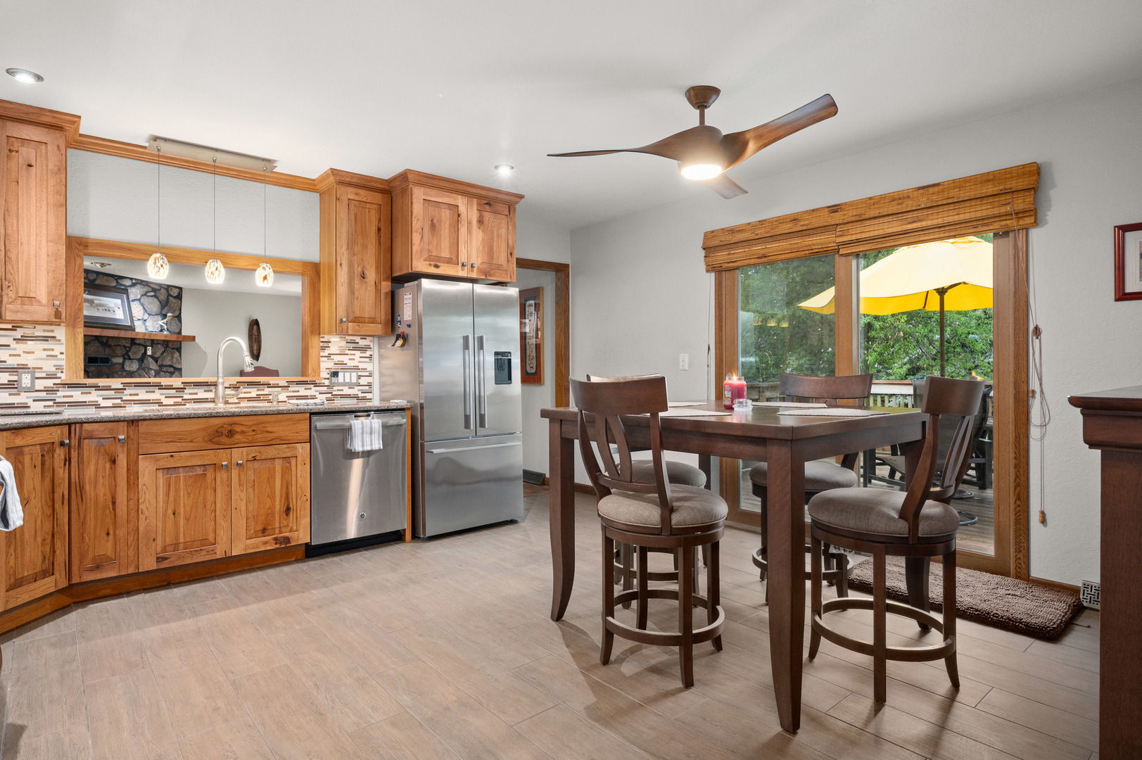 4496 South Mulford Road Rochelle, IL 61068 - Photo 24 of 52 a dining room with furniture and a kitchen view