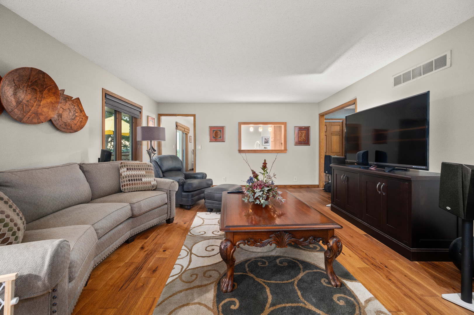 4496 South Mulford Road Rochelle, IL 61068 - Photo 30 of 52 a living room with furniture and a flat screen tv