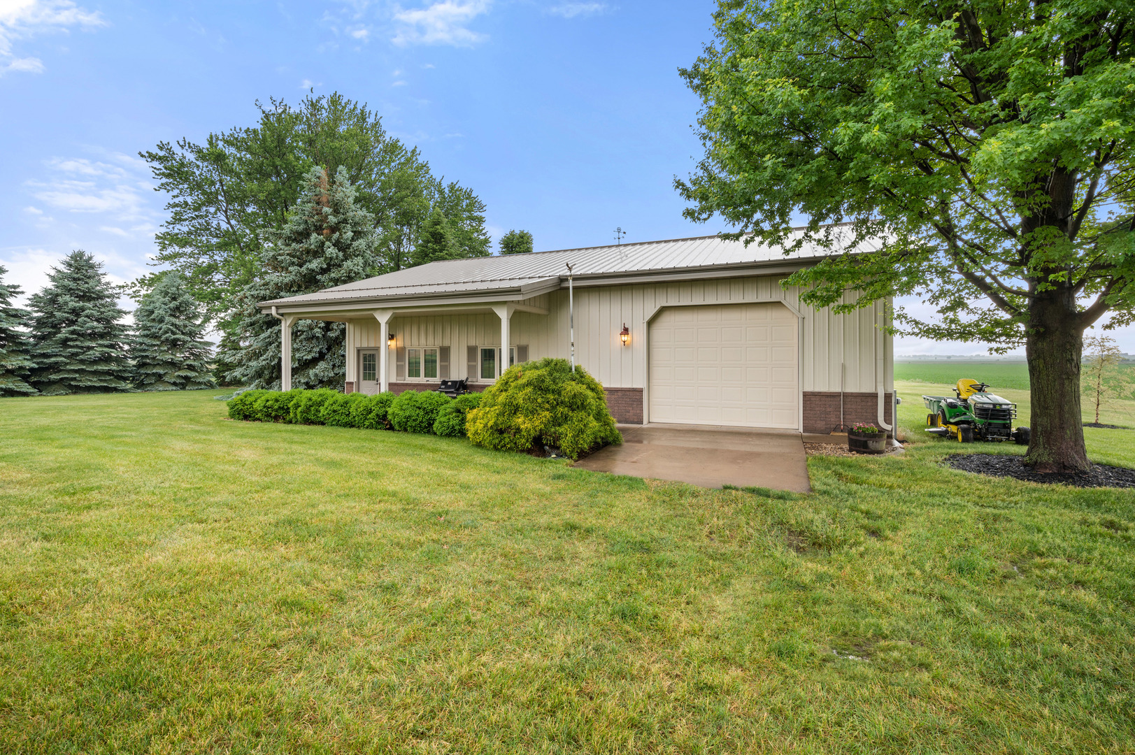 4496 South Mulford Road Rochelle, IL 61068 - Photo 3 of 52 a view of a house with backyard and garden