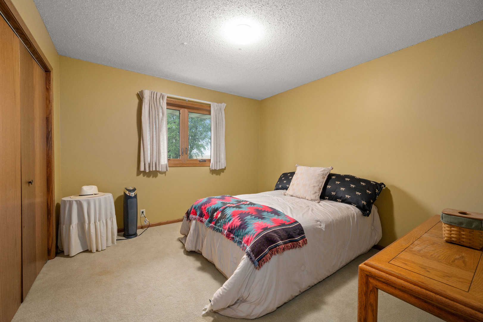 4496 South Mulford Road Rochelle, IL 61068 - Photo 39 of 52 a bedroom with a bed and wooden floor