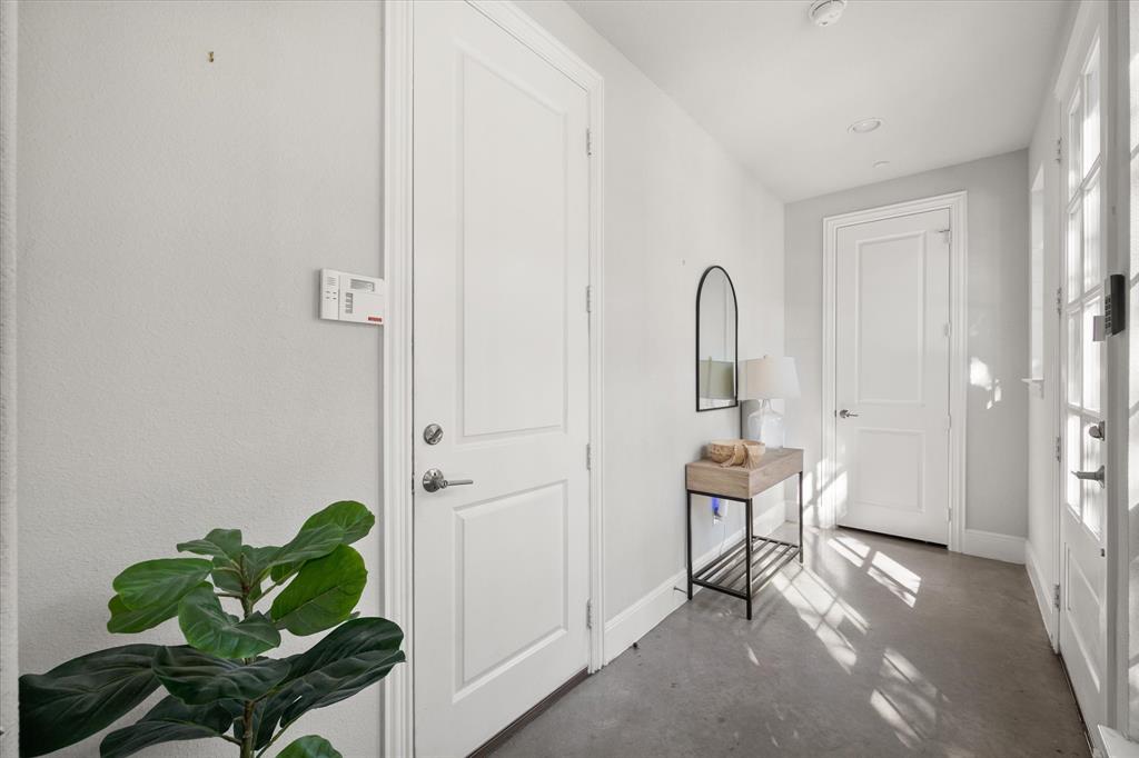 1900 Caddo Street, Unit 4 Dallas, TX 75204 - Photo 5 of 36 a view of an entryway with wooden floor