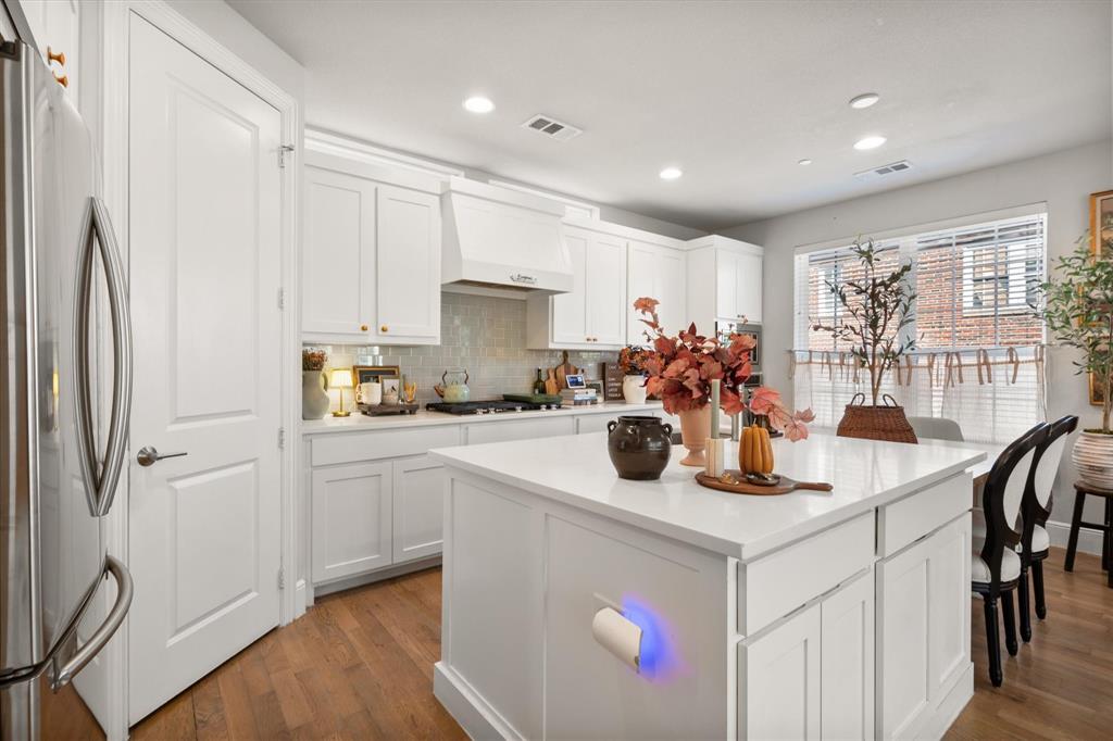1900 Caddo Street, Unit 4 Dallas, TX 75204 - Photo 10 of 36 a kitchen with a sink appliances and cabinets