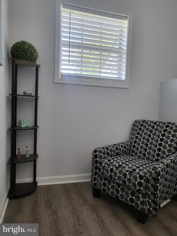 a bed room with a bed and a window