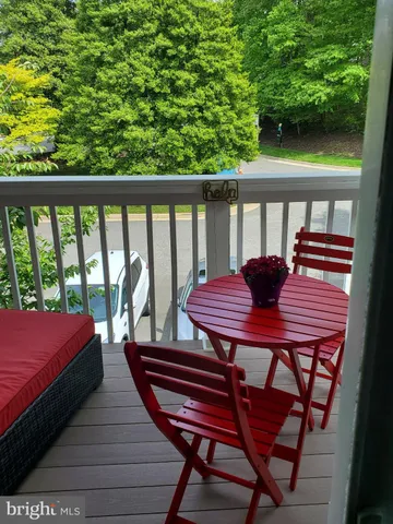 a view of a house with a yard and plants