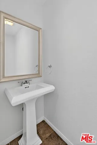 a view of a hallway with washer and dryer