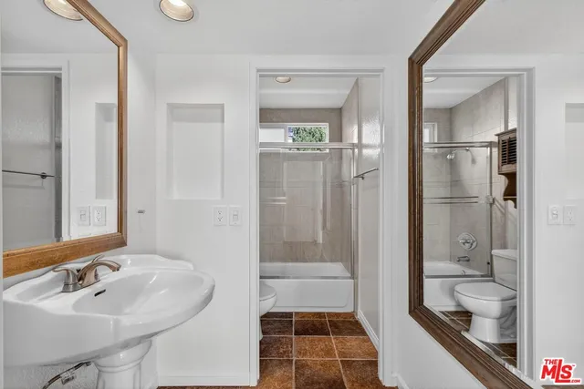 a view of a room with a hallway