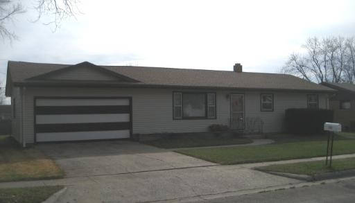 226 Phyllis Avenue Rochelle, IL 61068 - Photo 1 of 1 a front view of a house with a yard
