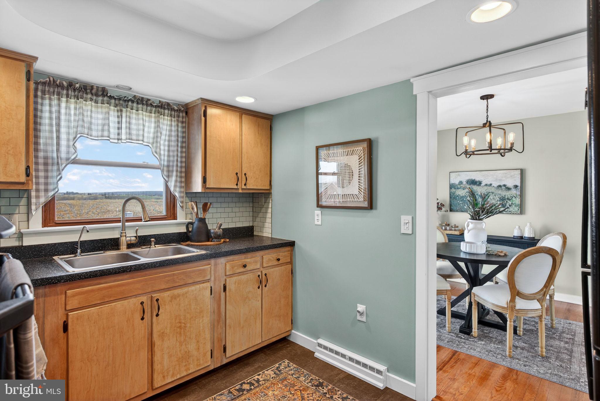 2103 South View Road Lancaster, PA 17602 - Photo 11 of 35 a kitchen that has cabinets counter space and a window