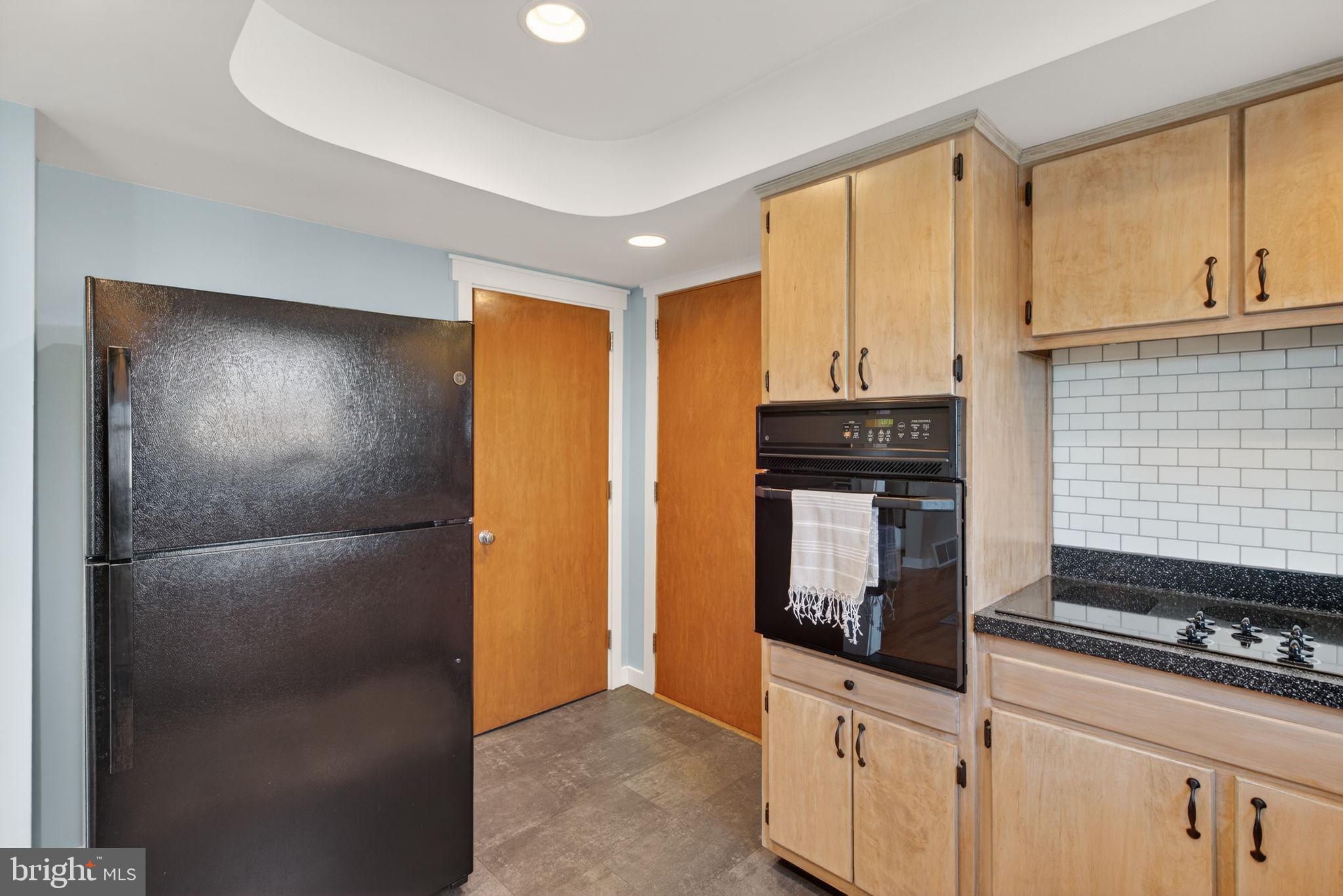 2103 South View Road Lancaster, PA 17602 - Photo 12 of 35 a kitchen with stainless steel appliances granite countertop a refrigerator and a stove
