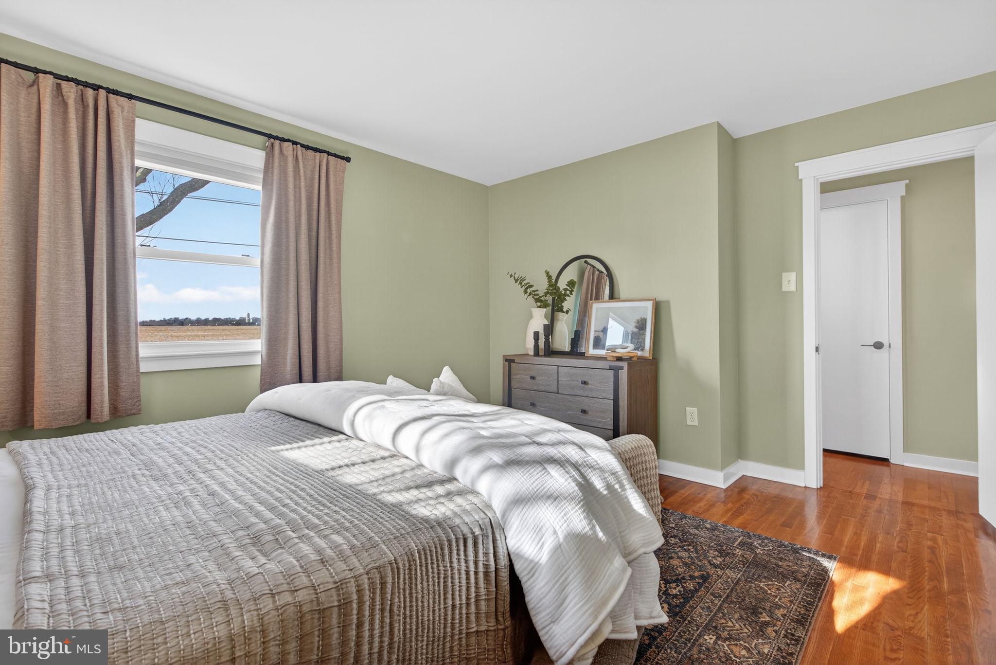 2103 South View Road Lancaster, PA 17602 - Photo 15 of 35 a bedroom with a bed and a dresser next to a window