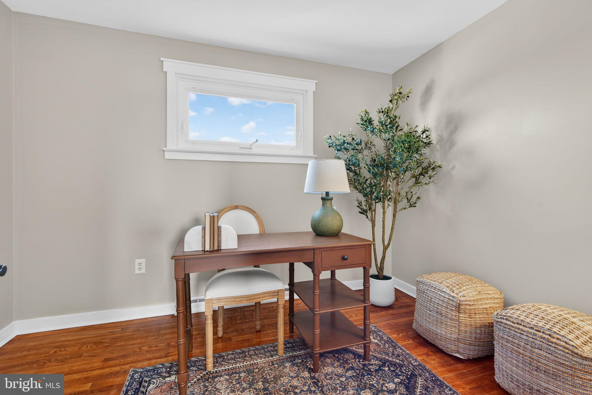 2103 South View Road Lancaster, PA 17602 - Photo 19 of 35 a view of a workspace room with wooden floor and chair