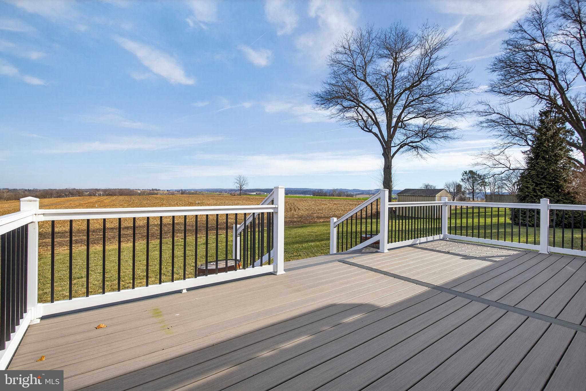 2103 South View Road Lancaster, PA 17602 - Photo 23 of 35 a view of a balcony with wooden floor and fence