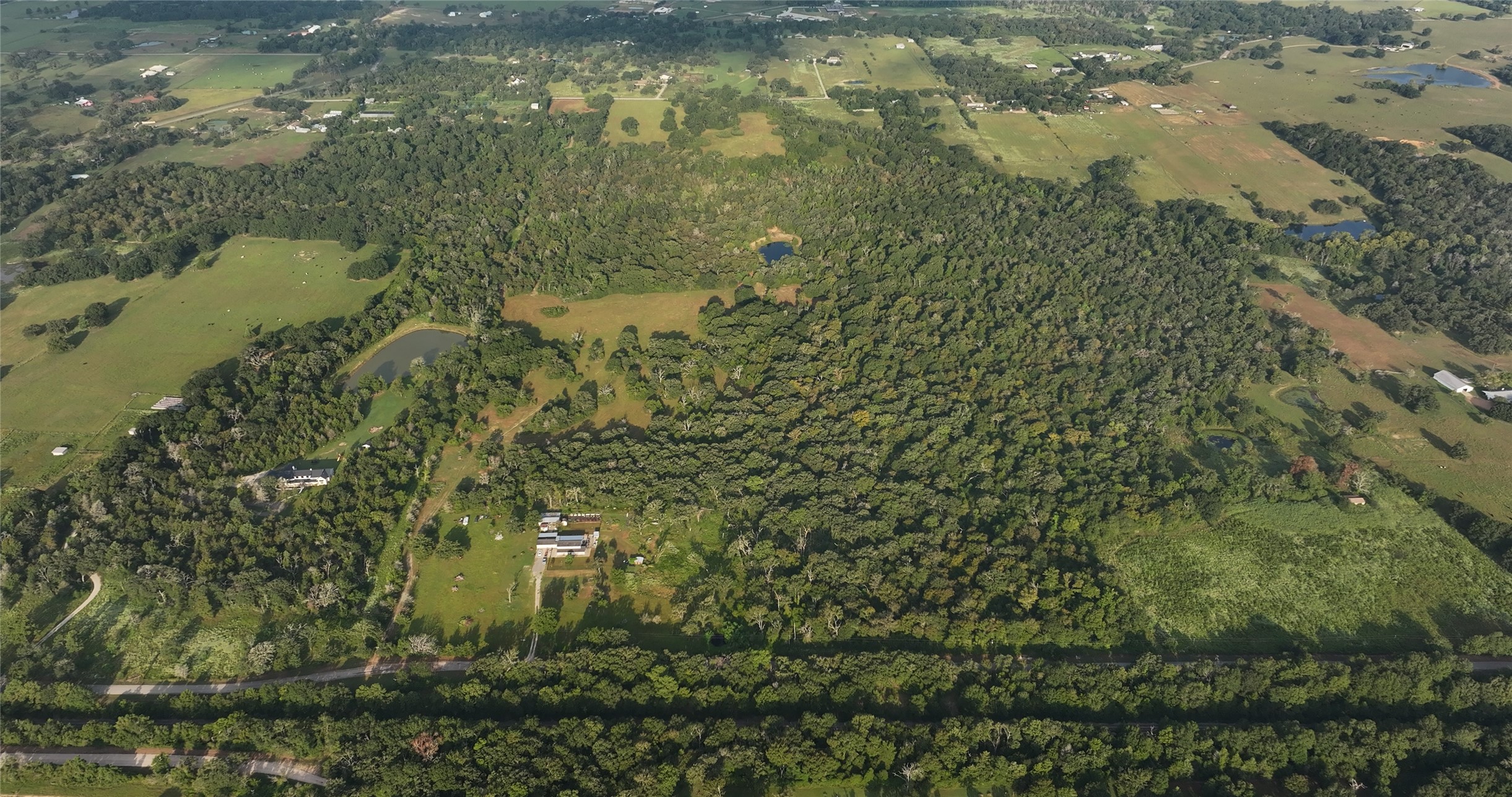 27296 Rock Island Road Hempstead, TX 77445 - Photo 26 of 30 a close view of residential houses and lake