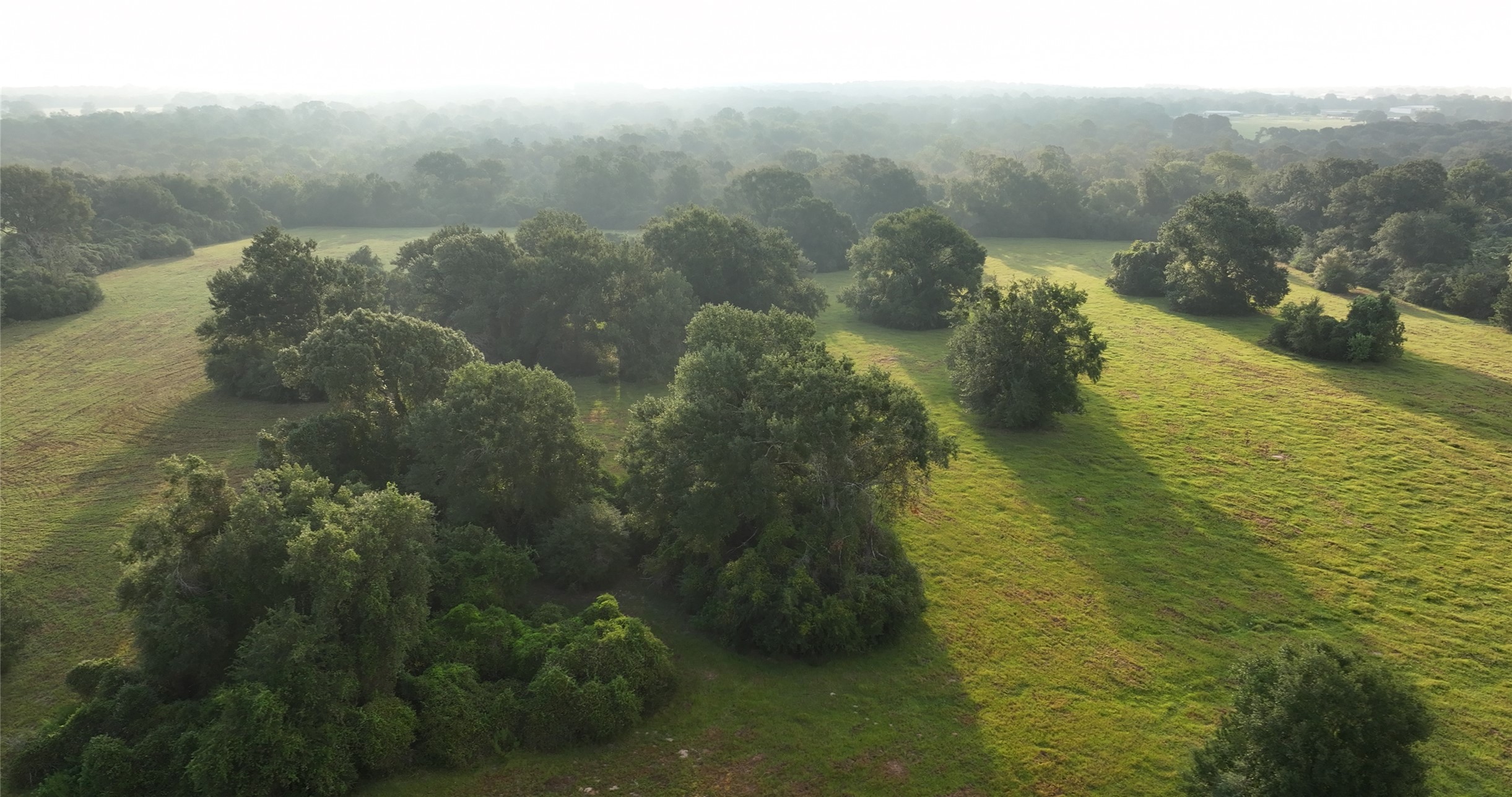 27296 Rock Island Road Hempstead, TX 77445 - Photo 5 of 30 a view of a lake in middle of the town