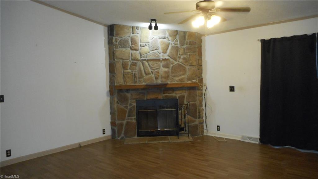 2621 Baltimore Road East Bend, NC 27018 - Photo 13 of 37 Stone Fireplace In Living Room