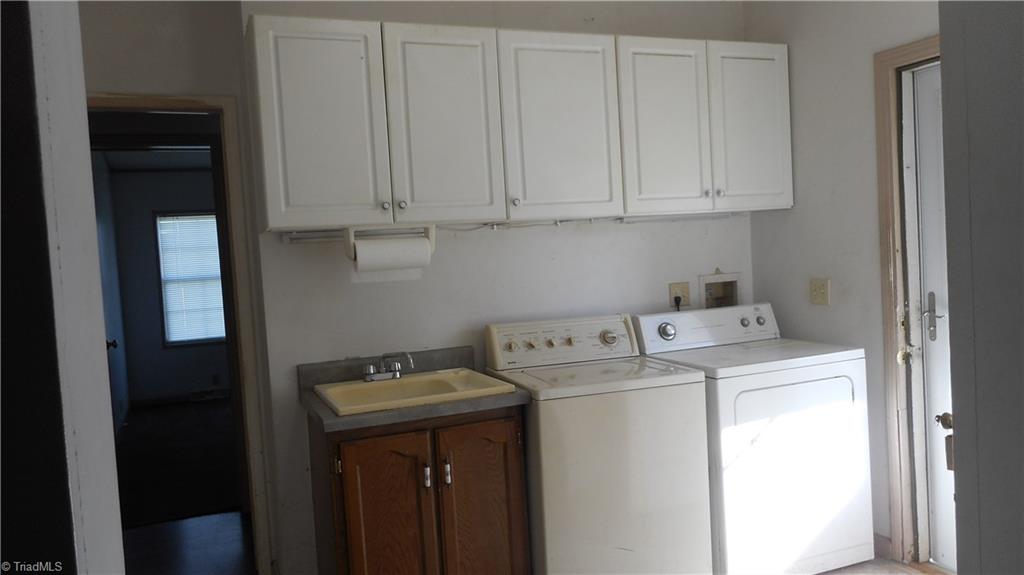 2621 Baltimore Road East Bend, NC 27018 - Photo 30 of 37 Large Laundry Room With Cabinets