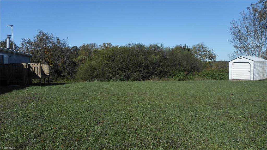 2621 Baltimore Road East Bend, NC 27018 - Photo 35 of 37 Large Rear Yard & 1 of 2 Storage Buildings