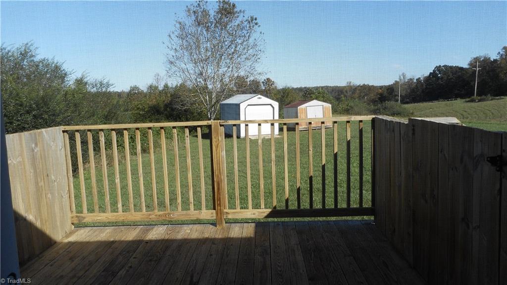 2621 Baltimore Road East Bend, NC 27018 - Photo 37 of 37 Deck Off Living Room & View Of Rear Yard