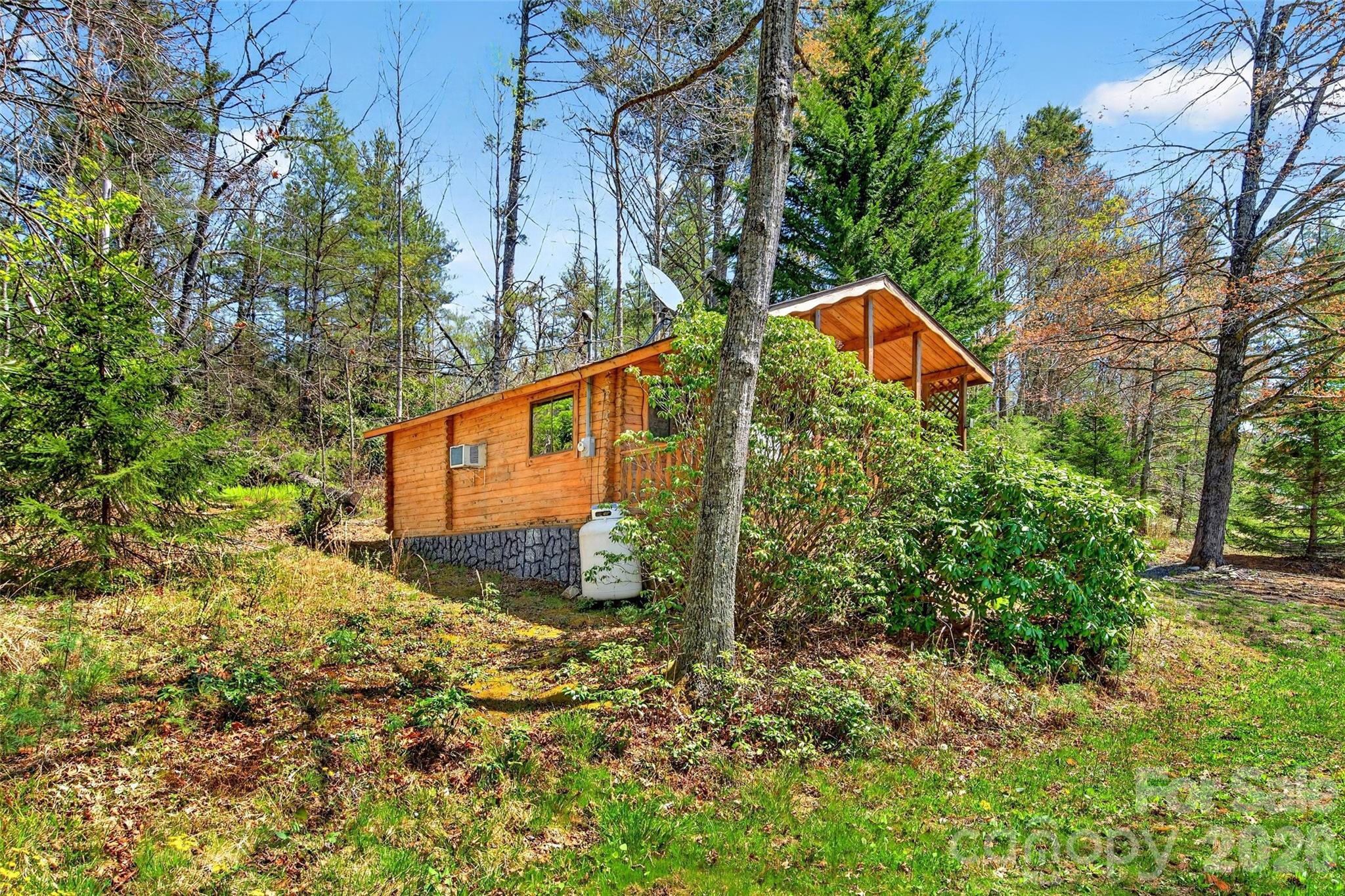 Tbd Jacksontown Road Spruce Pine, NC 28777 - Photo 5 of 19 a backyard of a house with lots of green space