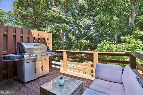 a view of outdoor space with garden and wooden fence