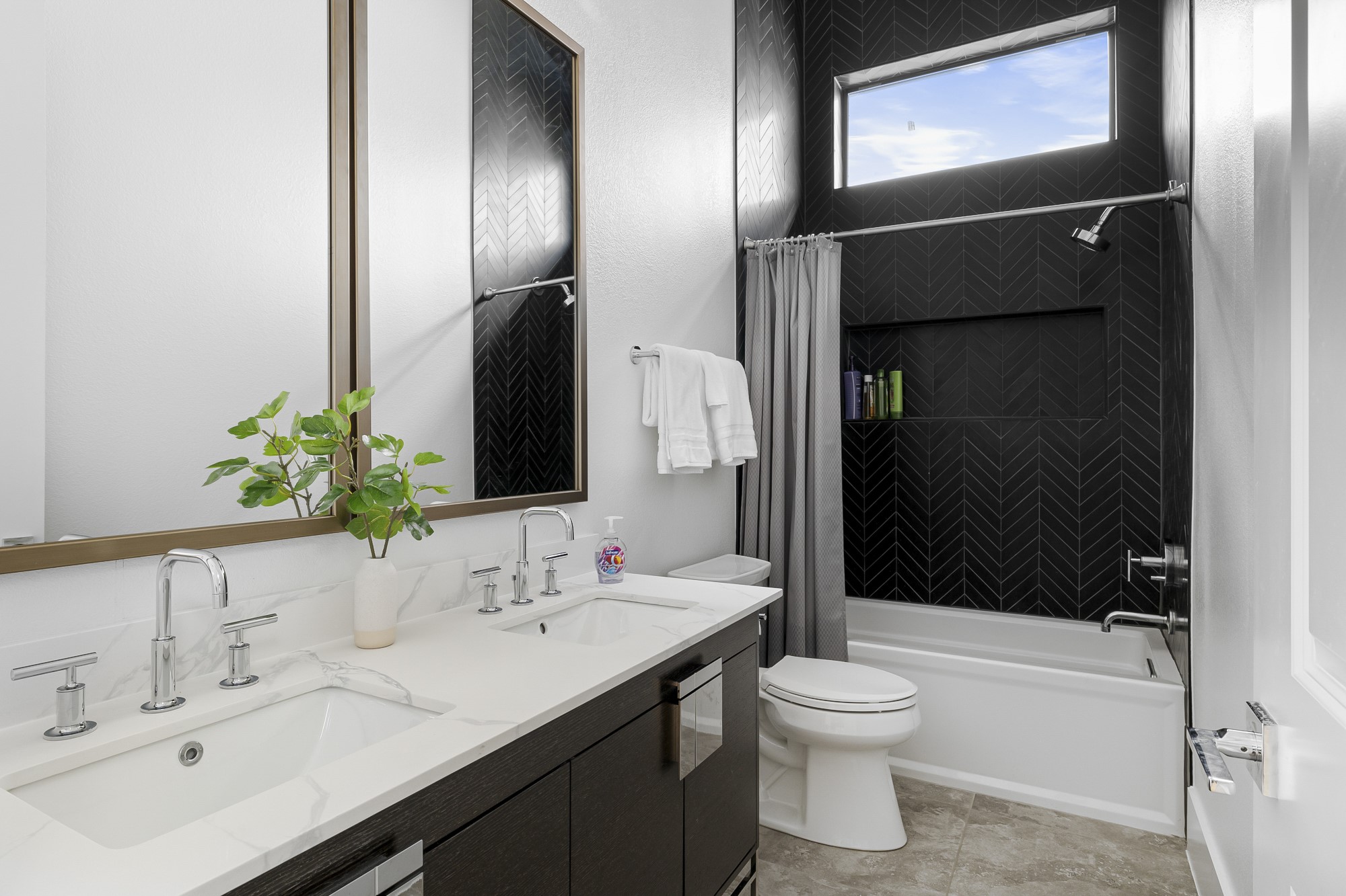 10211 Thistle Ridge Austin, TX 78733 - Photo 37 of 39 Full bath with toilet, shower / tub combo with curtain, and double vanity