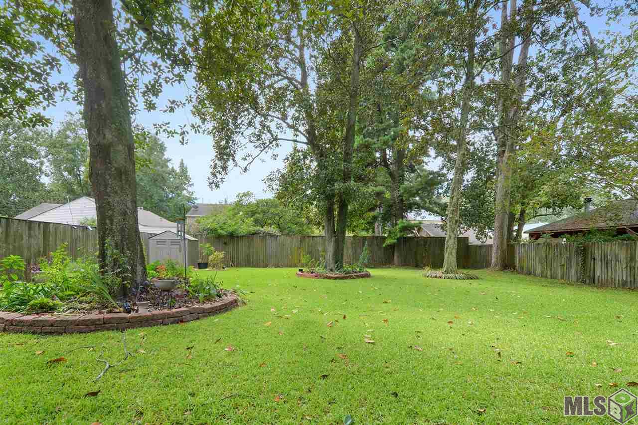 3142 Perkins Road Baton Rouge, LA 70808 - Photo 12 of 17 Huge rear porch overlooking beautiful backyard!