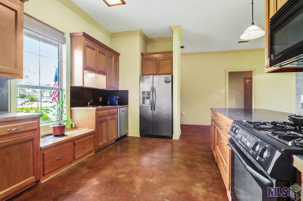 Kitchen with gas stovetop and breakfast bar!
