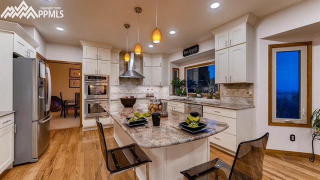 4995 Neal Ranch Road Colorado Springs, CO 80906 - Photo 4 of 8 Large Fully Remodeled Kitchen Featuring Granite and Stainless Steal Everything!