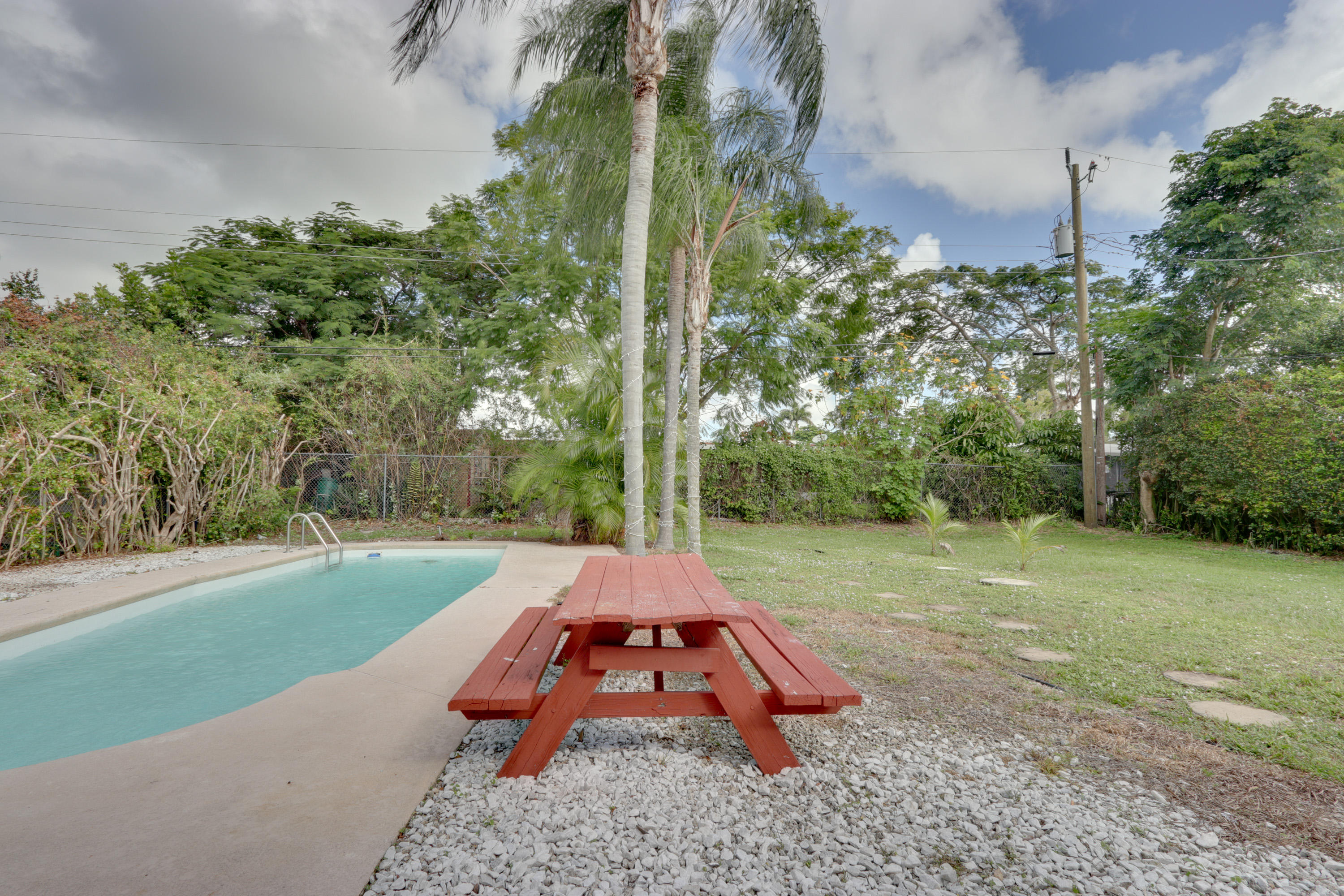 336 Mid Pines Road Palm Springs, FL 33461 - Photo 29 of 40 Pool/Back Yard