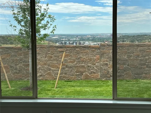 a bathroom with double sink and a mirror