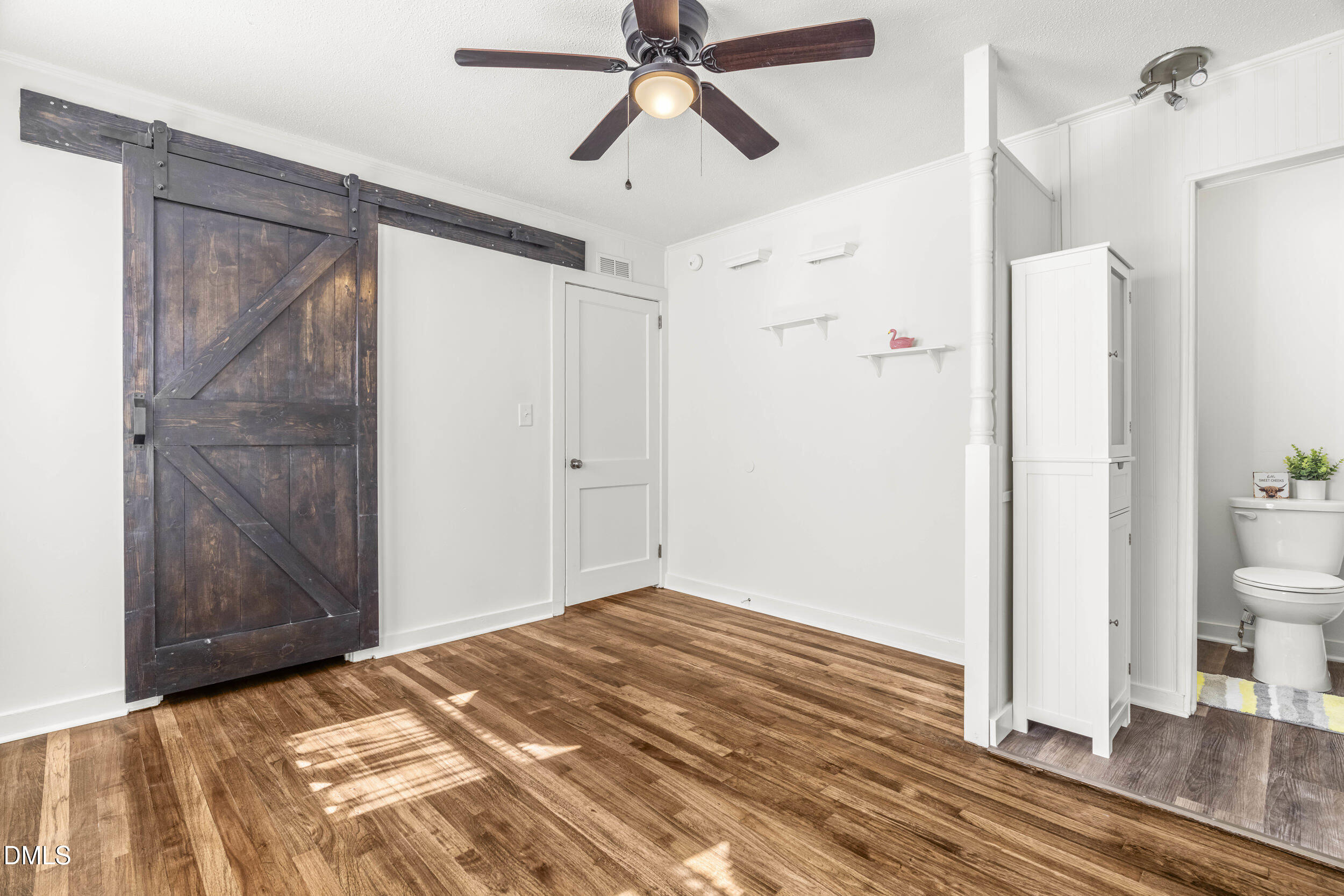 305 North 10th Street Erwin, NC 28339 - Photo 19 of 36 Bedroom w/barn door