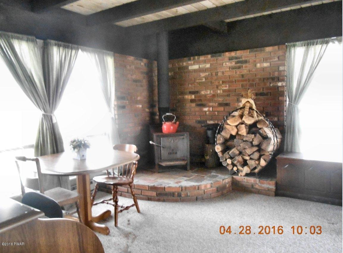 276 Forest Ridge Drive Hawley, PA 18428 - Photo 14 of 23 14-fam room woodstove