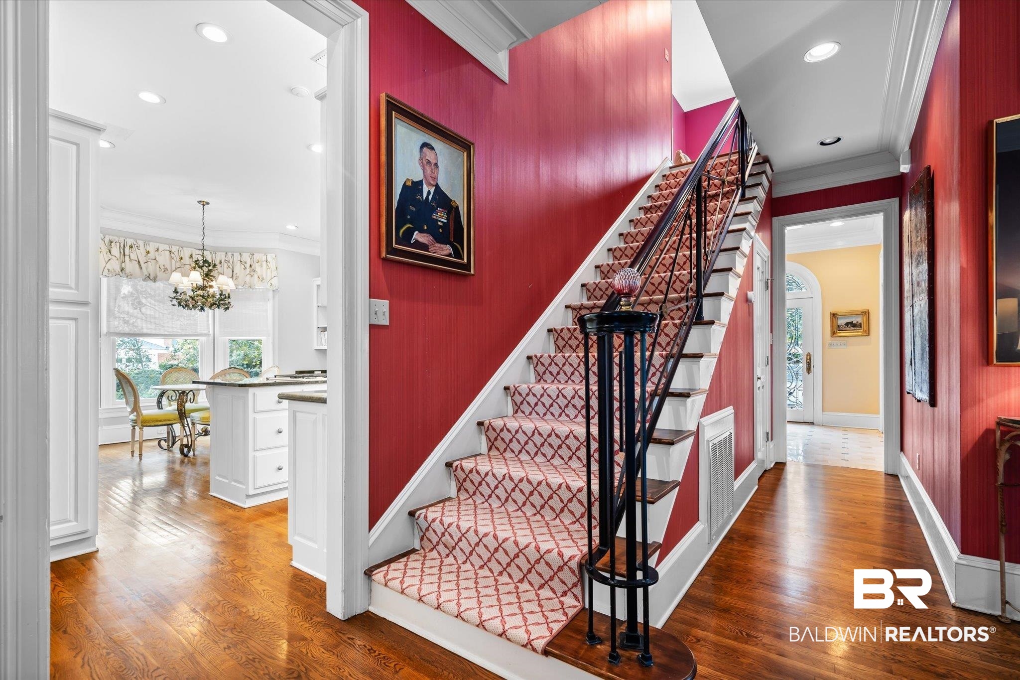 354 Dogwood Lane Mobile, AL 36608 - Photo 11 of 44 Stairway featuring ornamental molding, an inviting chandelier, and hardwood / wood-style floors