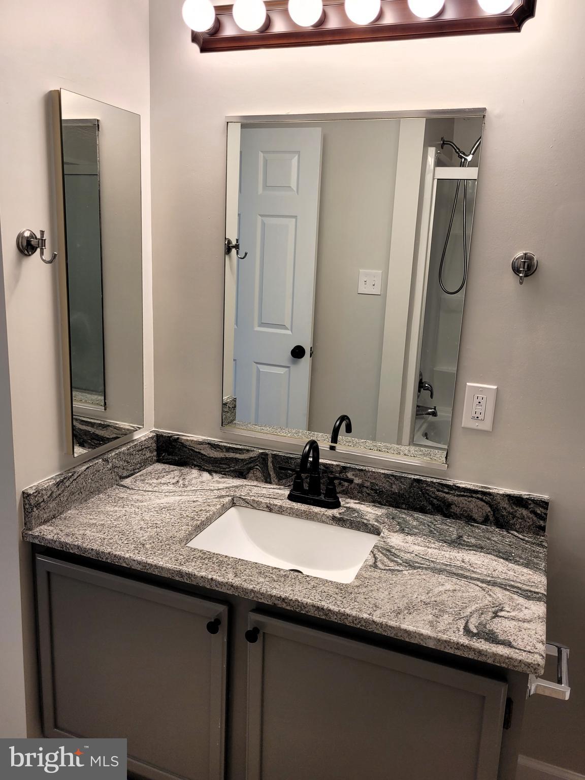 1110 Cavendish Drive Silver Spring, MD 20905 - Photo 13 of 22 Primary bath granite vanity