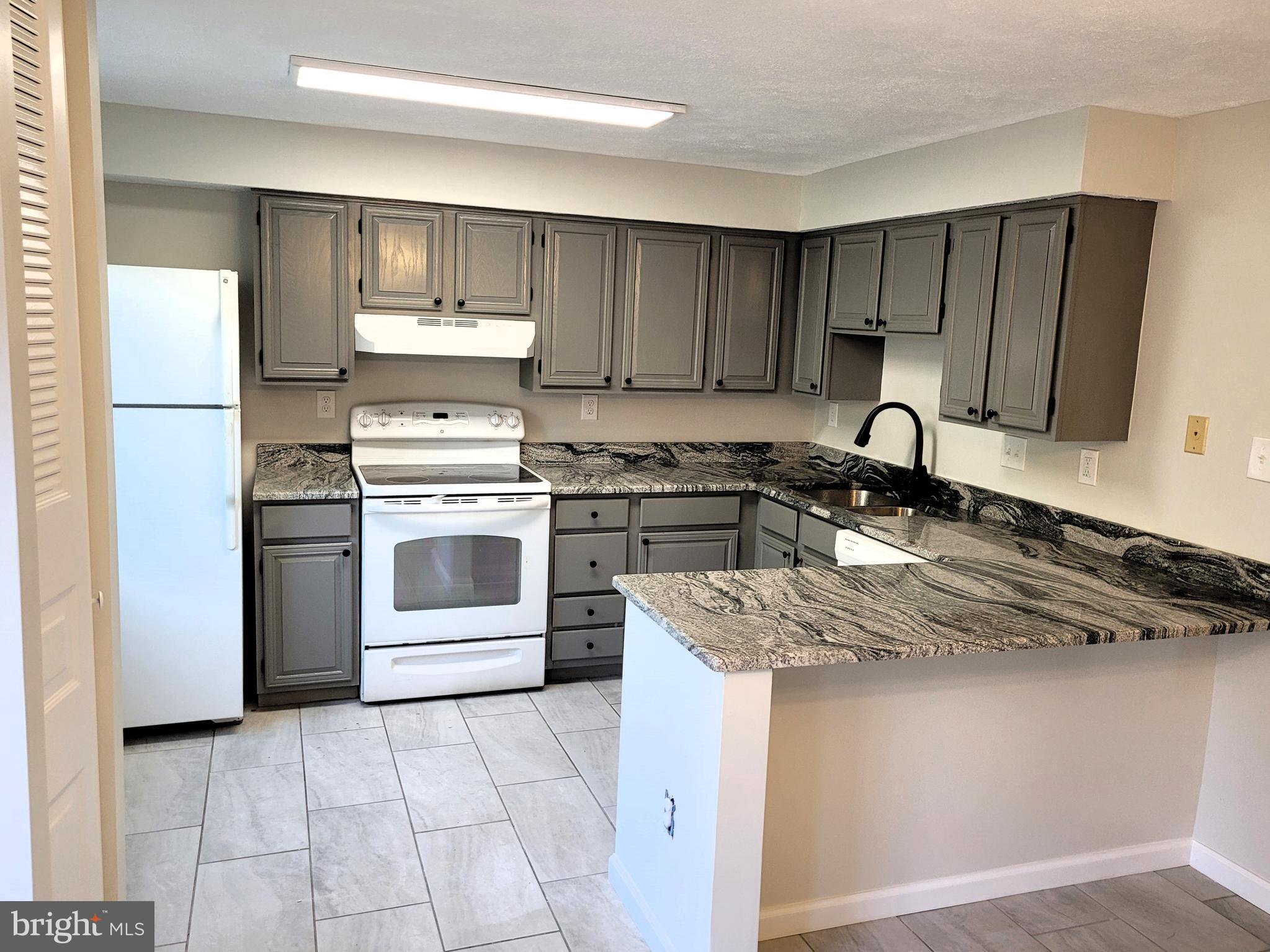 1110 Cavendish Drive Silver Spring, MD 20905 - Photo 2 of 22 Beautiful granite countertops + newer flooring