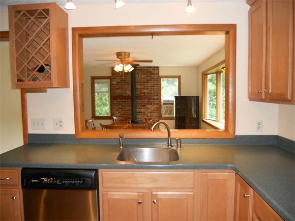 9 Golden Ball Road Weston, MA 02493 - Photo 14 of 27 a kitchen with a sink cabinets and a window