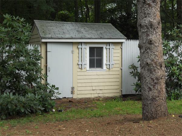 9 Golden Ball Road Weston, MA 02493 - Photo 3 of 27 a view of a house with a yard