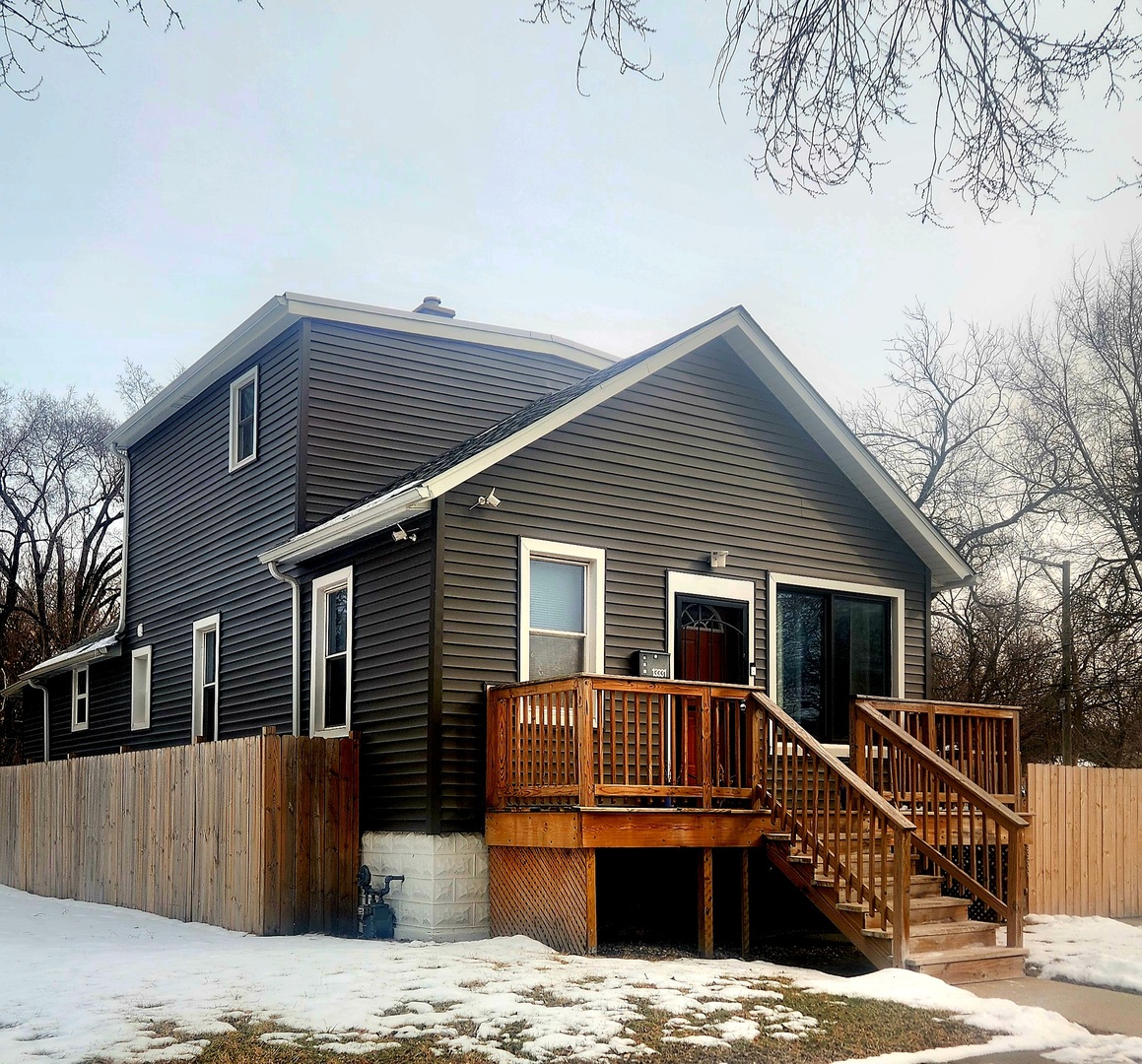 a view of a house with a roof deck