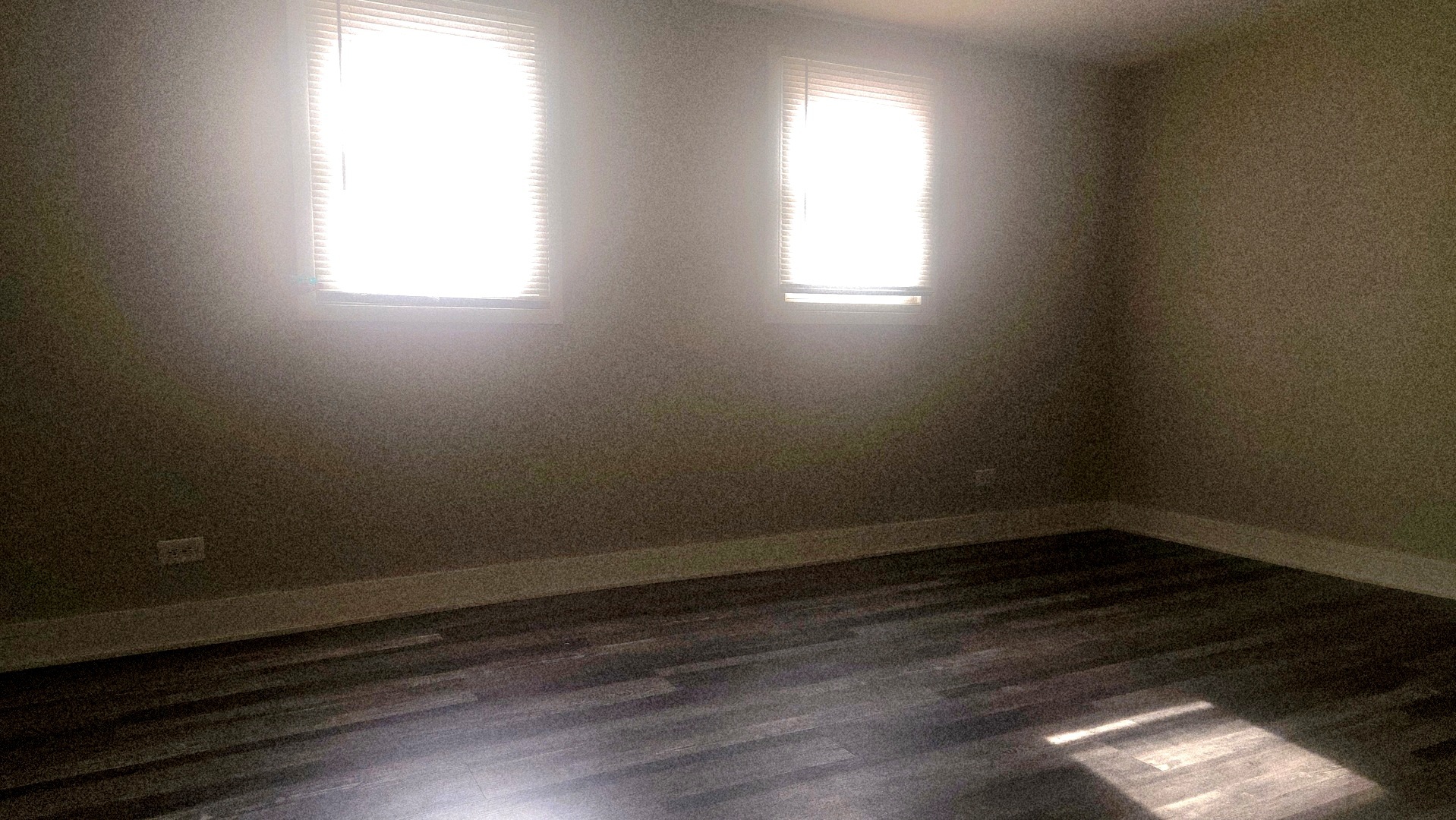 13331 South Calumet Avenue Chicago, IL 60827 - Photo 20 of 35 an empty room with wooden floor and windows