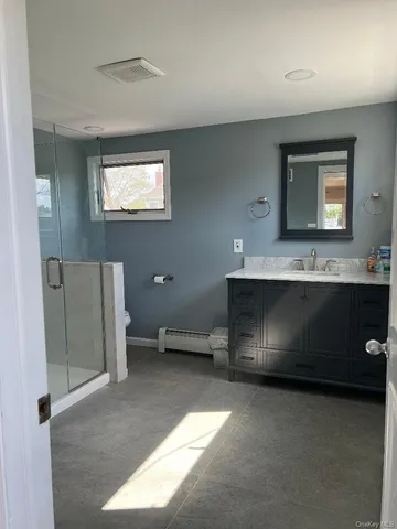 a view of kitchen with stainless steel appliances granite countertop cabinets and sink