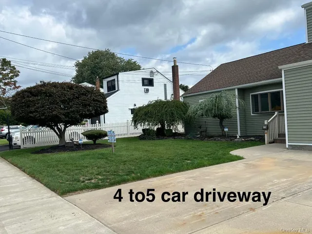 a view of a back yard of the house