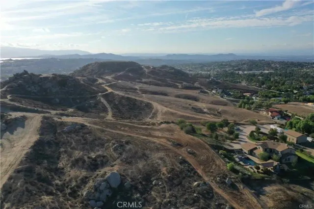 a view of a city with mountains in the background
