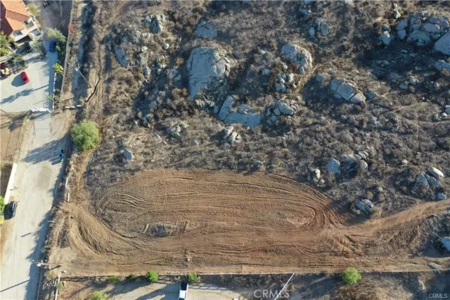 a view of a tree in front of a house