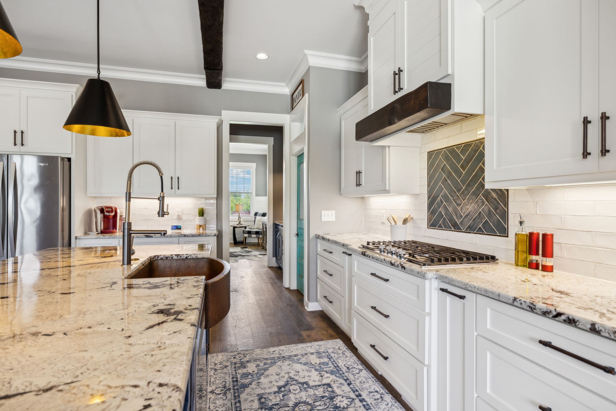 1236 Beechcroft Road Spring Hill, TN 37174 - Photo 26 of 70 a kitchen with stainless steel appliances granite countertop a stove a sink a refrigerator and cabinets