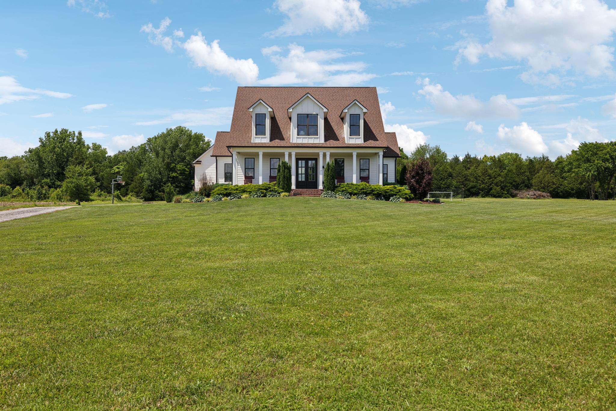 1236 Beechcroft Road Spring Hill, TN 37174 - Photo 3 of 70 a front view of a house with a garden