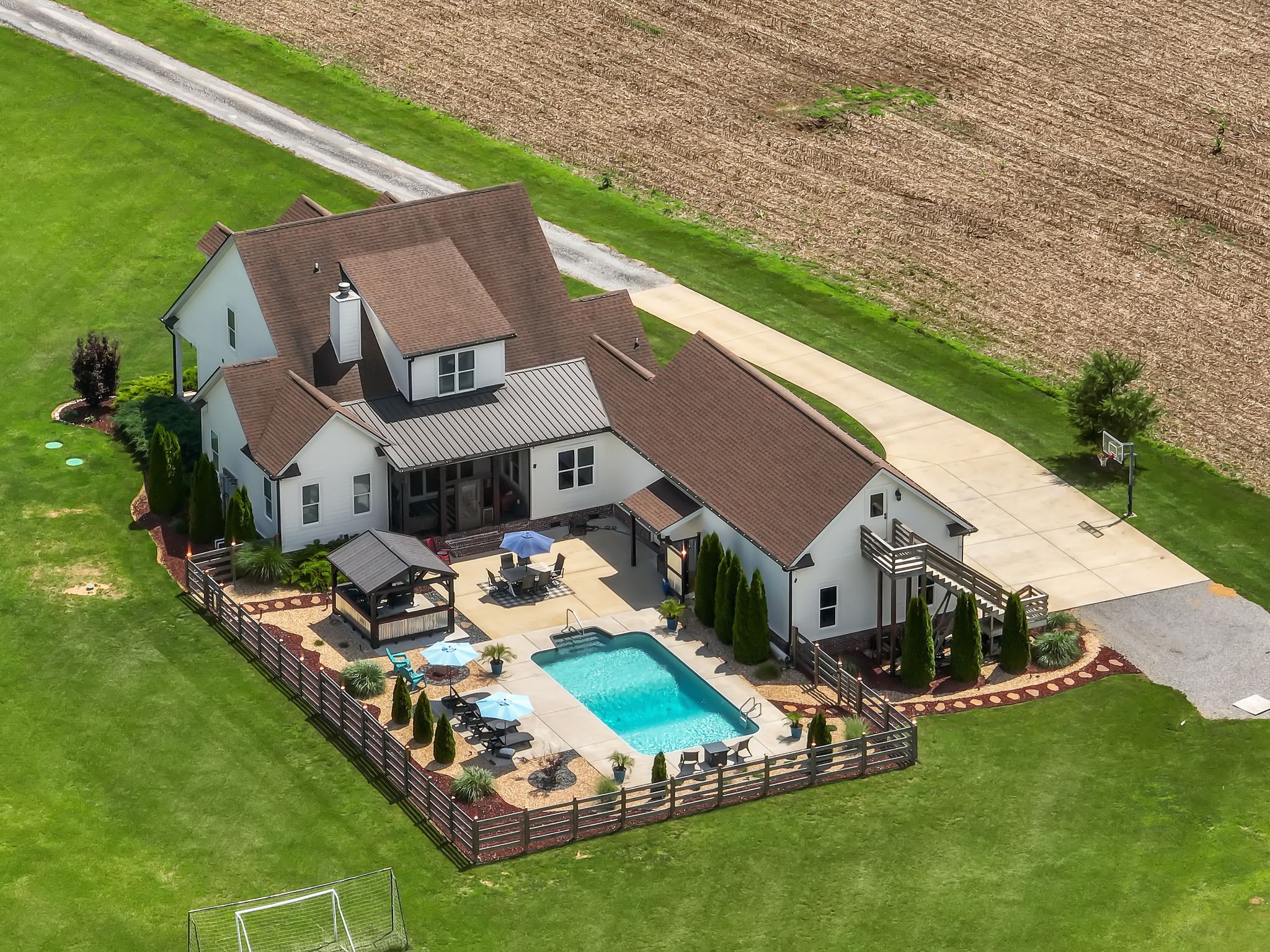 1236 Beechcroft Road Spring Hill, TN 37174 - Photo 61 of 70 an aerial view of a house with a garden