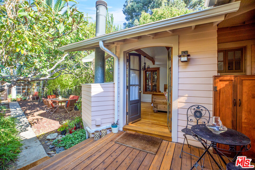761 Palms Boulevard Venice, CA 90291 - Photo 14 of 26 a view of a porch with furniture and a yard
